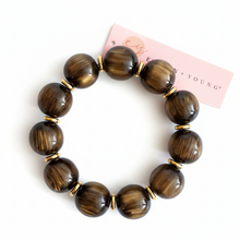 Load image into Gallery viewer, Bold Sphere Stretch Bracelet – Polished Round Bead Design
