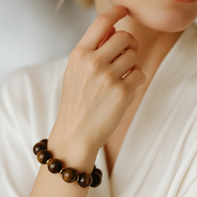 Load image into Gallery viewer, Bold Sphere Stretch Bracelet – Polished Round Bead Design
